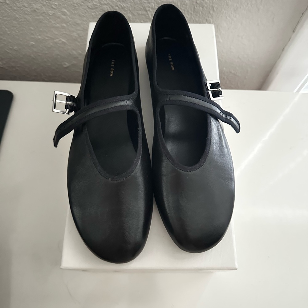 The Row Black Leather Mary Jane Flats